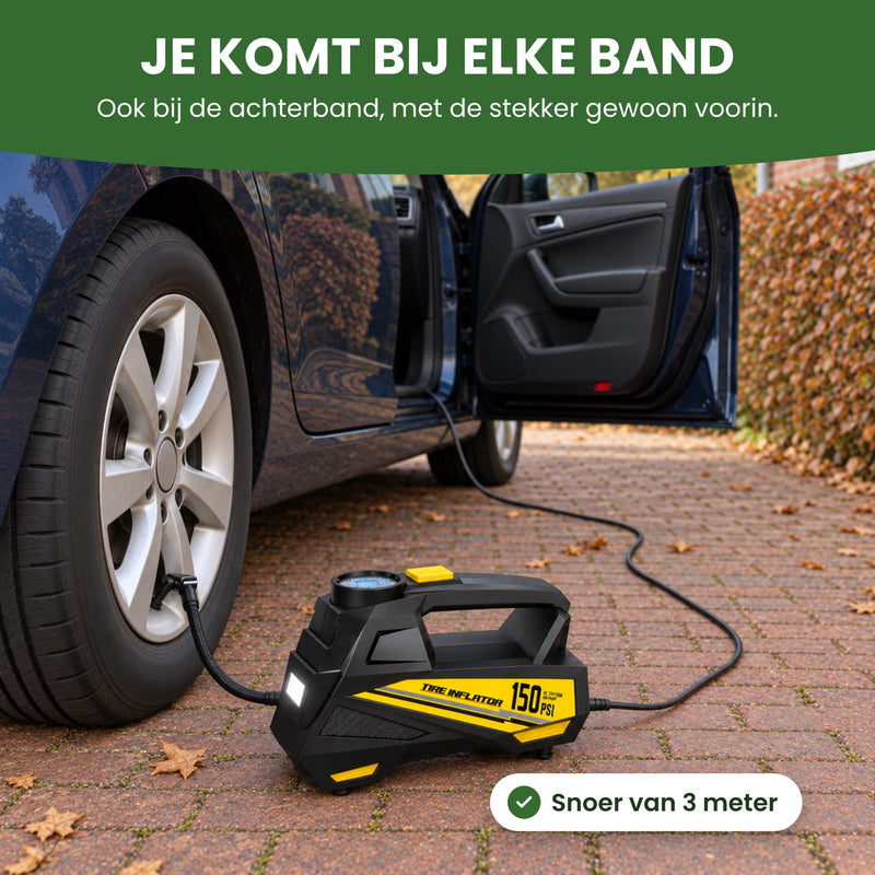 Het snoer loopt van de open voordeur langs de auto naar de AirBoost bij de achterband: met het snoer van 3 meter kom je bij elke band