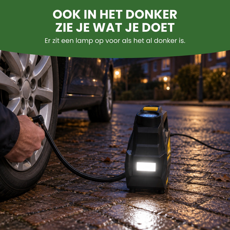 In de schemering schijnt de lamp van de AirBoost op het wiel en de hand bij het ventiel: ook in het donker zie je wat je doet