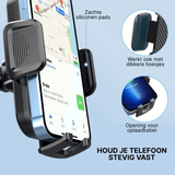 Telefon w czarnym uchwycie Holdify z silikonowymi podkładkami, odpowiedni do etui i z otworem na kabel do ładowania.