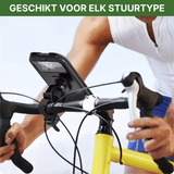 Uchwyt na telefon przymocowany do kierownicy roweru wyścigowego z zawodnikiem w akcji w tle.